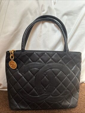 CHANEL Black Quilted Caviar Leather Tote with Gold Medallion Charm